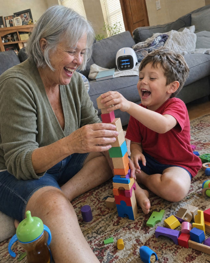 On the rug with the grandchildren
