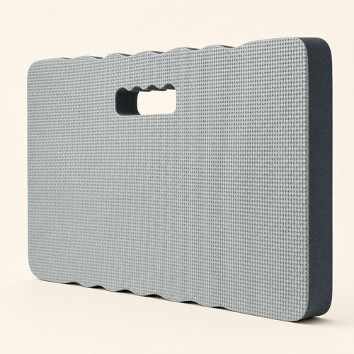 The grey foam garden kneeler pad standing on its long edge, showing the woven top, the charcoal sides and the cut-out carry handle